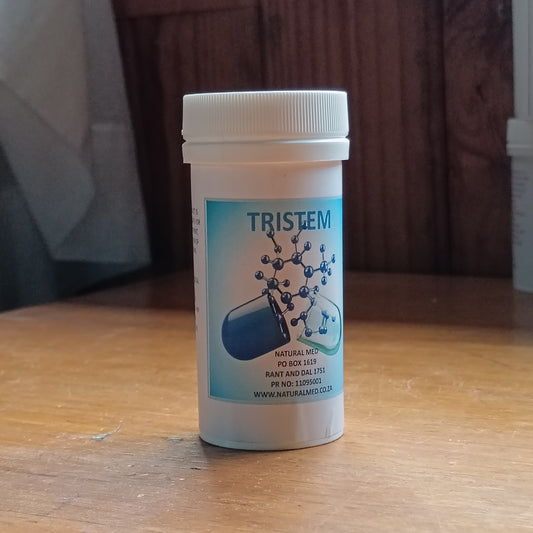 Tristem supplement bottle on a wooden surface with a blurred background